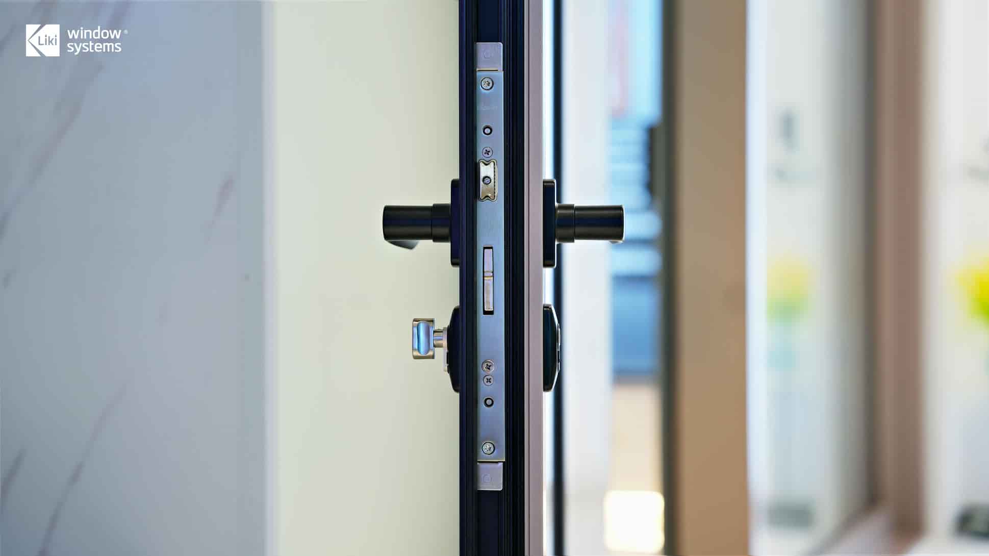 Close-up of the multi-point locking system on a LIKI French door for enhanced home security.