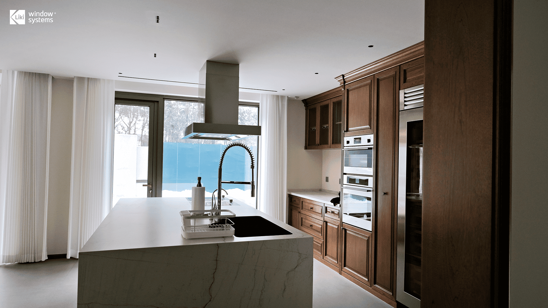 Modern kitchen interior looking out through a LIKI thermal break aluminum French door onto a snowy landscape, demonstrating superior energy efficiency and insulation in cold climates.